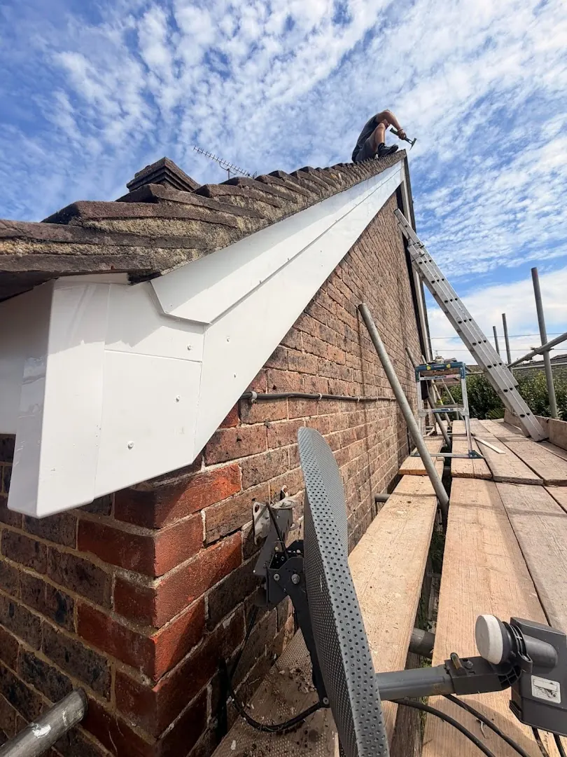New bargeboard finished on a brick gable, FR Roofing Solutions