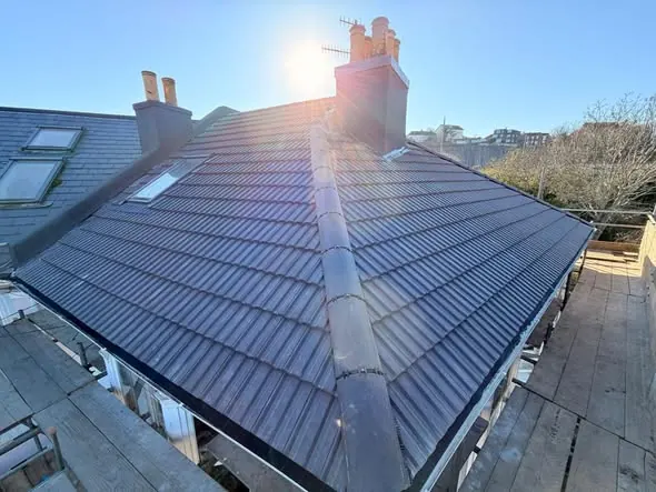 Grey tile re-roof with the chimney stack, Brighton, March 2026, FR Roofing Solutions
