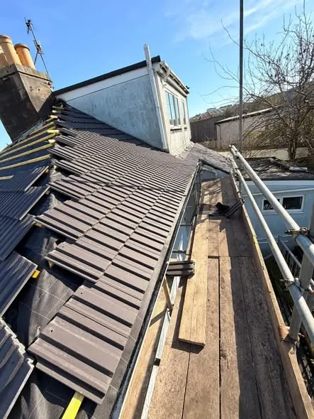 Grey tile re-roof finished round a dormer, Brighton, March 2026, FR Roofing Solutions