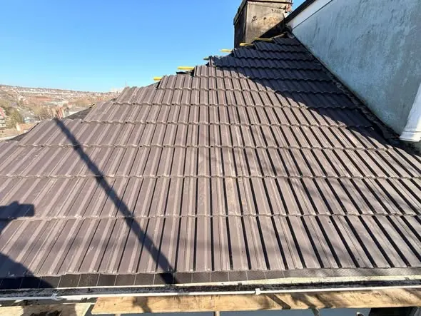 Full slope of new grey tiles, Brighton re-roof, March 2026, FR Roofing Solutions