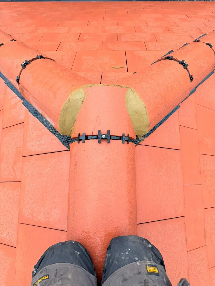 Dry ridge unions fixed on a new red tile ridge, FR Roofing Solutions
