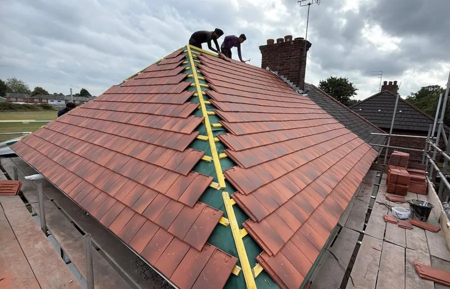The team fixing the dry ridge on the East Grinstead re-roof, FR Roofing Solutions