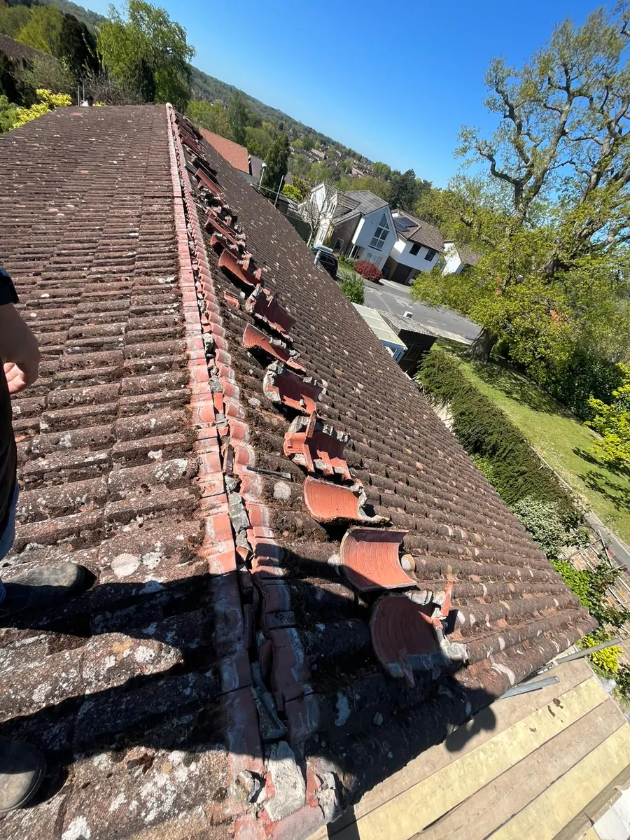 Ridge tiles ground out and re-bedded in East Grinstead, April 2026, FR Roofing Solutions