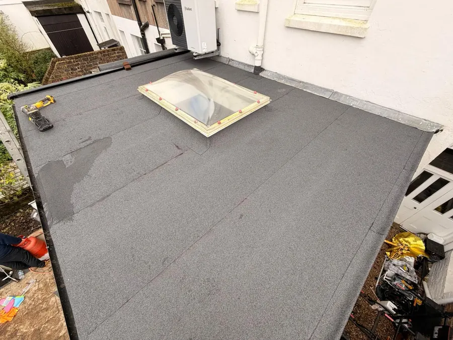 New flat roof with a rooflight, finished, FR Roofing Solutions