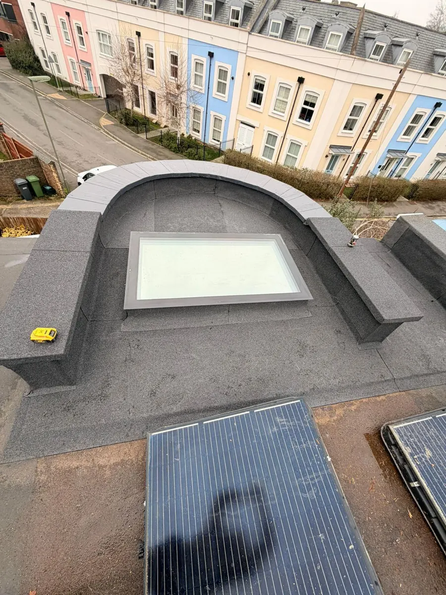 Flat roof with a rooflight above the street, FR Roofing Solutions