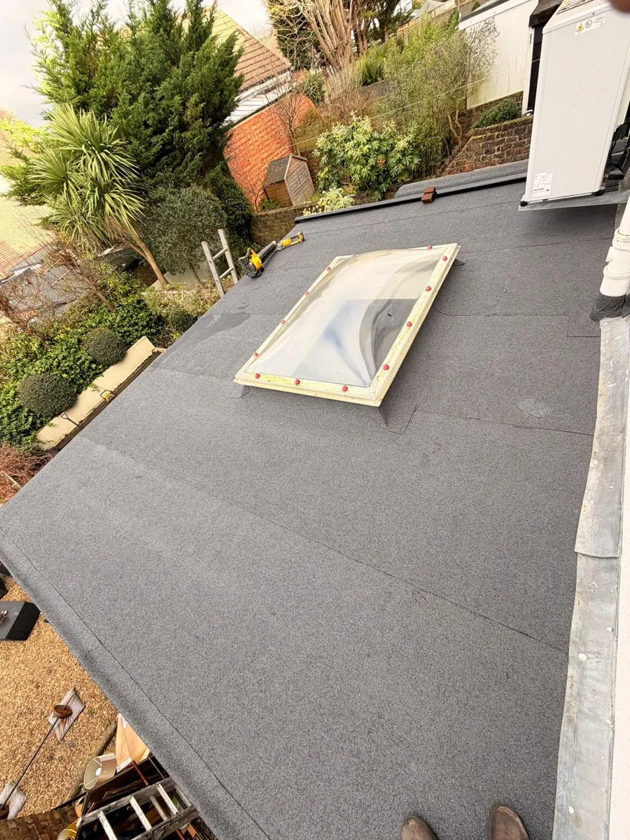 New flat roof round a rooflight above the garden, FR Roofing Solutions
