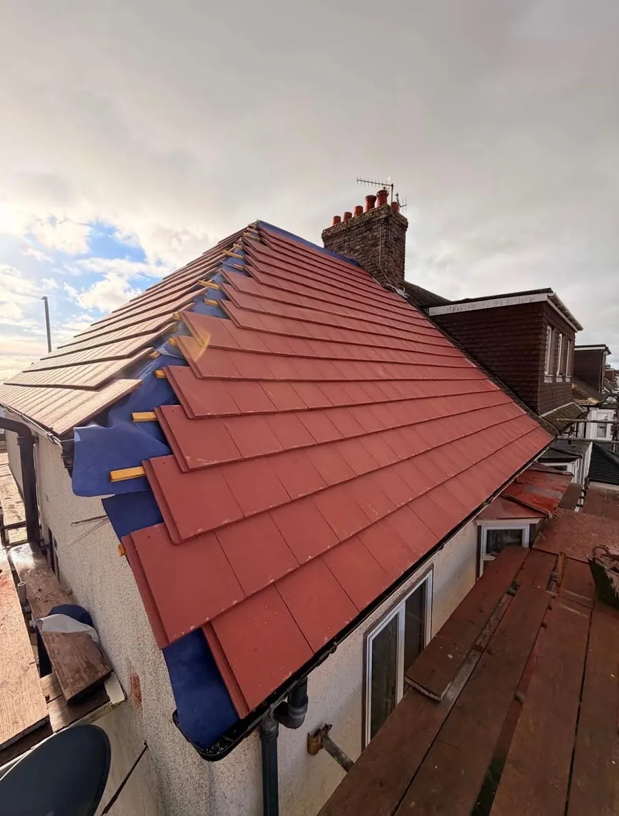 New red tile roof over new breathable felt and graded battens, from our own scaffold, FR Roofing Solutions