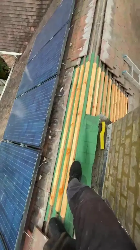 Ridge opened with new battens beside the solar panels, FR Roofing Solutions